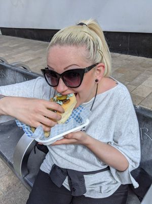 Happy vegans eating Vausages at Vausages in Lichfield