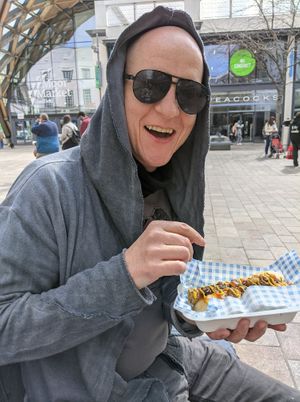 Happy vegans eating Vausages at Vausages in Lichfield