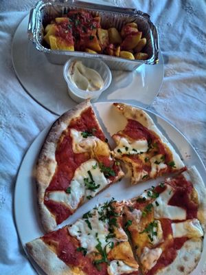 Vegan mozzarella pizza and patatas bravas at Bar Iberico in Nottingham