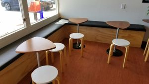 A few small indoor tables & a couple more outside at Tom Thumb in Paraparaumu Beach