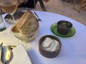 Bread olives and tahini was good but it was not shown on the menu and seemed to be offered as included  at Hambrë  in Ibiza