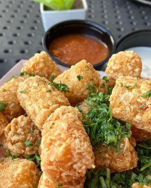 These tots were amazing & the 2 sauces fantastic   at Heirloom Craft Kitchen in Indio