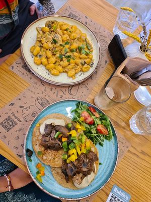 vegan cheese-mushroom gnocchi and vegan jackfruit-mushroom pancakes  at Rubik's Superfood & Coffee in Patras