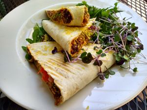 Vegan quesadilla with walnut "meat", nut cheese, avocado, tomato, onion at Food and Thought in Naples