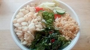 I requested that they put 4 different sides in the same bowl (I had lima beans, steamed greens, tomato brown rice, and vegetables) at Food and Thought in Naples