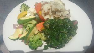 Sides: veggies, herb potatoes and greens. at Food and Thought in Naples