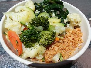 I ordered several sides: steamed greens, vegetable medley, and tomato brown rice. Yum. at Food and Thought in Naples