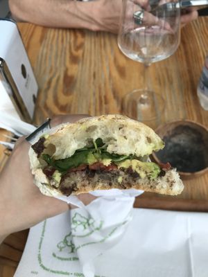 Vegan Sandwich with arugula, avocado, tomato and olives paste at NaturalMente in Varenna