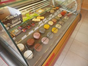 Selection of vegan cheeses at Pasteleria Serra in Gandia