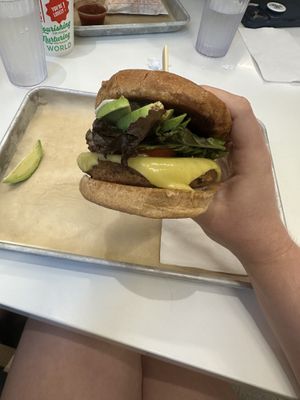 signature burger with american cheese  at Next Level Burger - Potrero Hill in San Francisco