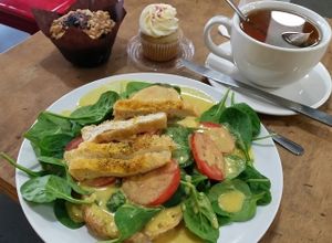 wirthless: biscuit, spinach, tomato, tofu, hollandaise sauce.  Marionberry muffin. Confetti cupcake.  at Sweetpea Baking Company in Portland