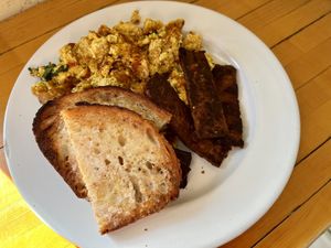 Tofu scramble with tempeh bacon and toast (you have to ask for the toast)  at Sweetpea Baking Company in Portland