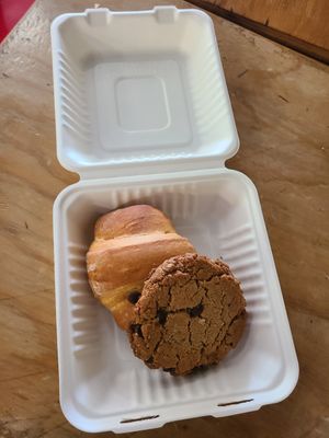 The only photo I've actually taken- everything gets devoured too quickly otherwise. Peanut butter chocolate cookie and tofu scramble croissant! at Sweetpea Baking Company in Portland