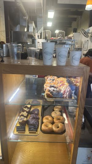 pastry case next to register at Sweetpea Baking Company in Portland