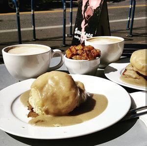 Biscuits and Gravy with seitan bacon at Sweetpea Baking Company in Portland