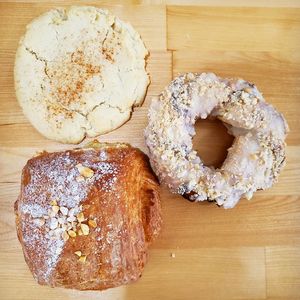 Snickerdoodle cookie, cashew coconut pastry ring, and peanut butter croissant. YUM. Photo taken April 2019. at Sweetpea Baking Company in Portland