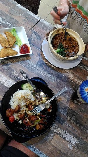 Half eaten chilli chicken at Cameleon Vegetarian Bean Curd in Kuala Lumpur