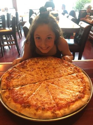 Enjoying a New York pizza  at Joe Pesto's in Squamish