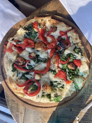 My small build-your-own pizza, which included olive oil (sans sauce), vegan cheese, roasted garlic, roasted red peppers and spinach.  at G's Pizza - Howard Ave in New Orleans