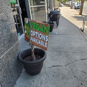 Love the signs for Vegans. at G's Pizza - Howard Ave in New Orleans