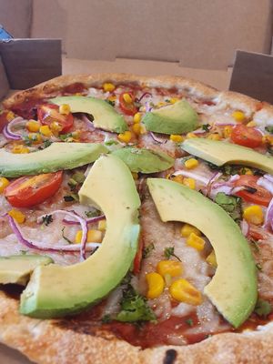 Vegan rainbow pizza. Comes with vegan cheese. Lunch special $9 pizza. at G's Pizza - Howard Ave in New Orleans