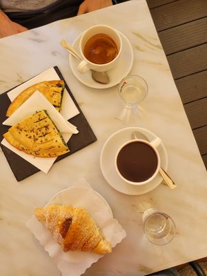 coffe, spinach panini, apricot croissant, hot chocolate at Antico Caffe Scaletto in Bologna