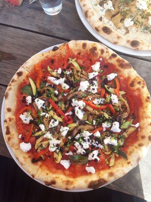 Eggplant, bell pepper and zucchini pizza with vegan feta at Tanner in Helsinki