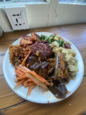Buffet selection to fill you plate. 2-30k rice and 10-18k a additional dish item. Delicious food, will be going regularly   at Give Cafe in Canggu