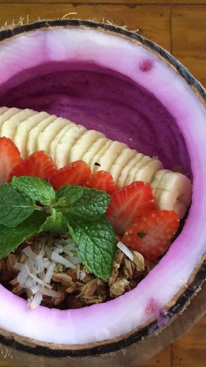 Berry smoothie bowl with more granola on the bottom!  at Give Cafe in Canggu