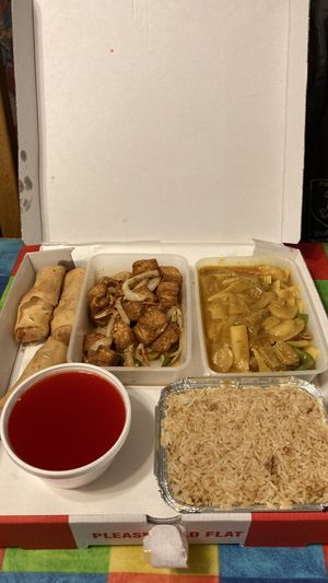 Left to right: veg spring rolls, sweet and sour sauce, salt and chilli tofu, fried rice (minus the egg), vegan chicken in satay sauce  at China Express Finaghy Takeaway in Belfast