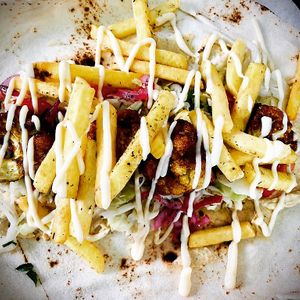Cauliflower Shawarma & Za'atar Fries wrapped in freshly baked bread. 🌯 [meatless] at Garbanzo - Falafel & Hummus Bar in Vienna