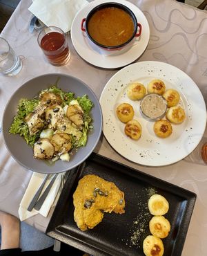 Vegan bograč, a salad, baked dödöle and a fried wheat steak with pumpkin seeds at Güjžina - Green One Bistro in Ljubljana