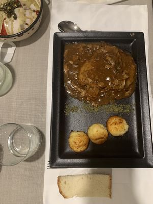 Seitan steak with potatoes at Güjžina - Green One Bistro in Ljubljana