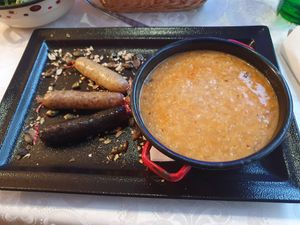 Prosena repa s tremi klobasicami. at Güjžina - Green One Bistro in Ljubljana