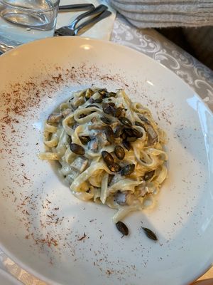 Tagliatelle with ham and pumpkin seeds at Güjžina - Green One Bistro in Ljubljana