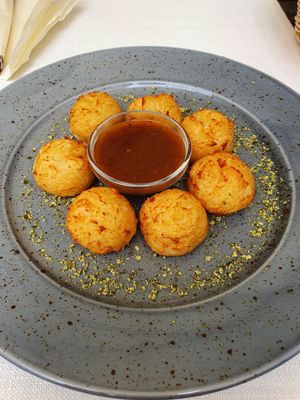 Potato cakes with mushroom sauce at Güjžina - Green One Bistro in Ljubljana