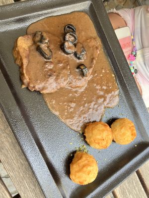 Seitan steak with plum sauce  at Güjžina - Green One Bistro in Ljubljana