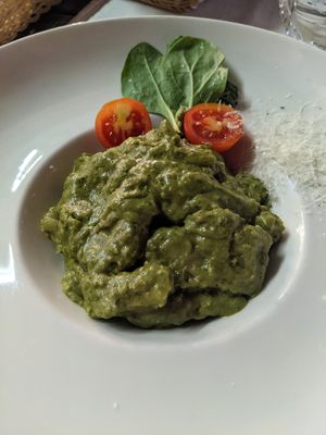 Pumpkin seed pesto gnocchi at Güjžina - Green One Bistro in Ljubljana