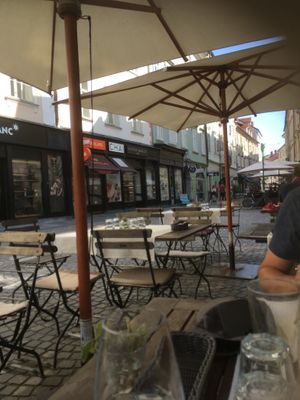 Outdoor patio at Güjžina - Green One Bistro in Ljubljana