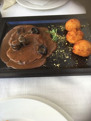 Steak with plum sauce at Güjžina - Green One Bistro in Ljubljana