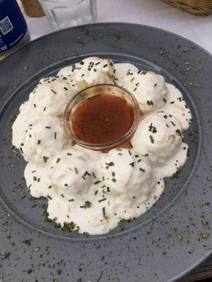 dödöle with onions and cream  at Güjžina - Green One Bistro in Ljubljana