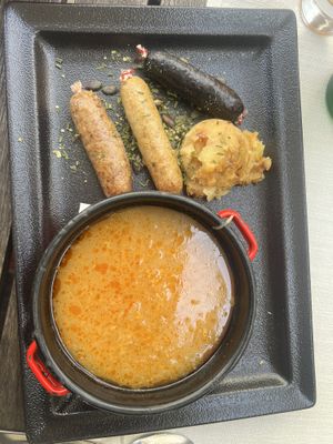 Sausages with sauerkraut soup  at Güjžina - Green One Bistro in Ljubljana