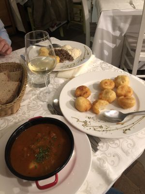 Vegan bograç with flour potatoes  at Güjžina - Green One Bistro in Ljubljana