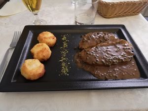  seitan steak with dodolle at Güjžina - Green One Bistro in Ljubljana