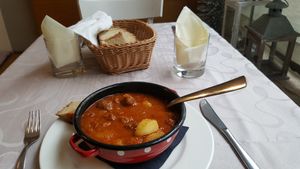 vegan borac (seitan with spices, soy cubes, potatoes, onions, garlic) at Güjžina - Green One Bistro in Ljubljana