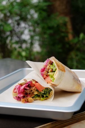 Pulled oyster mushroom wrap
parsley mayo, smoky oyster mushrooms, red cabbage slaw, tomatoes, mustard caviar, fermented gherkins   at Paralela in Prague