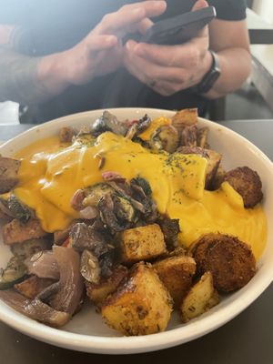 Beyond sausage cheezy hash  at Sweet Pea Cafe & Playhouse in Edmonton