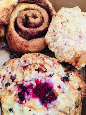 Baked goods like cinnamon rolls, scones and muffins at Sweet Pea Cafe & Playhouse in Edmonton