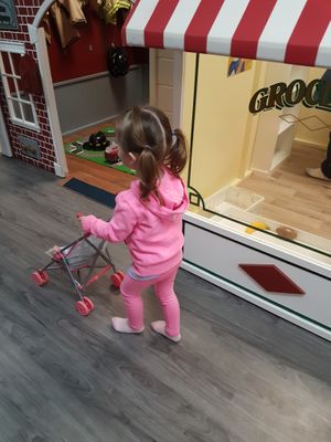 In the playroom before eating at Sweet Pea Cafe & Playhouse in Edmonton