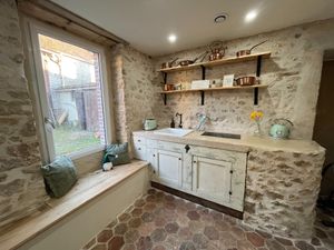 The kitchen in Bella's Cottage. at La Grange DesRochers in Paley
